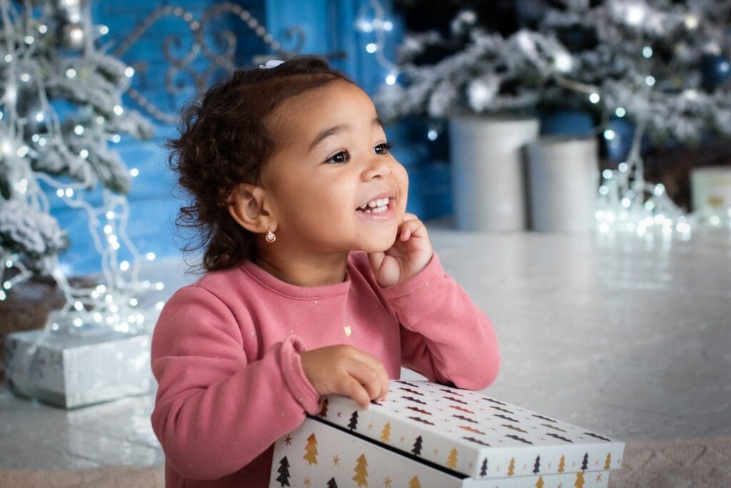 Cute girl with a Christmas present