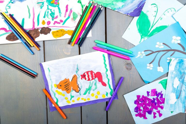 Kids painting and artwork of fish