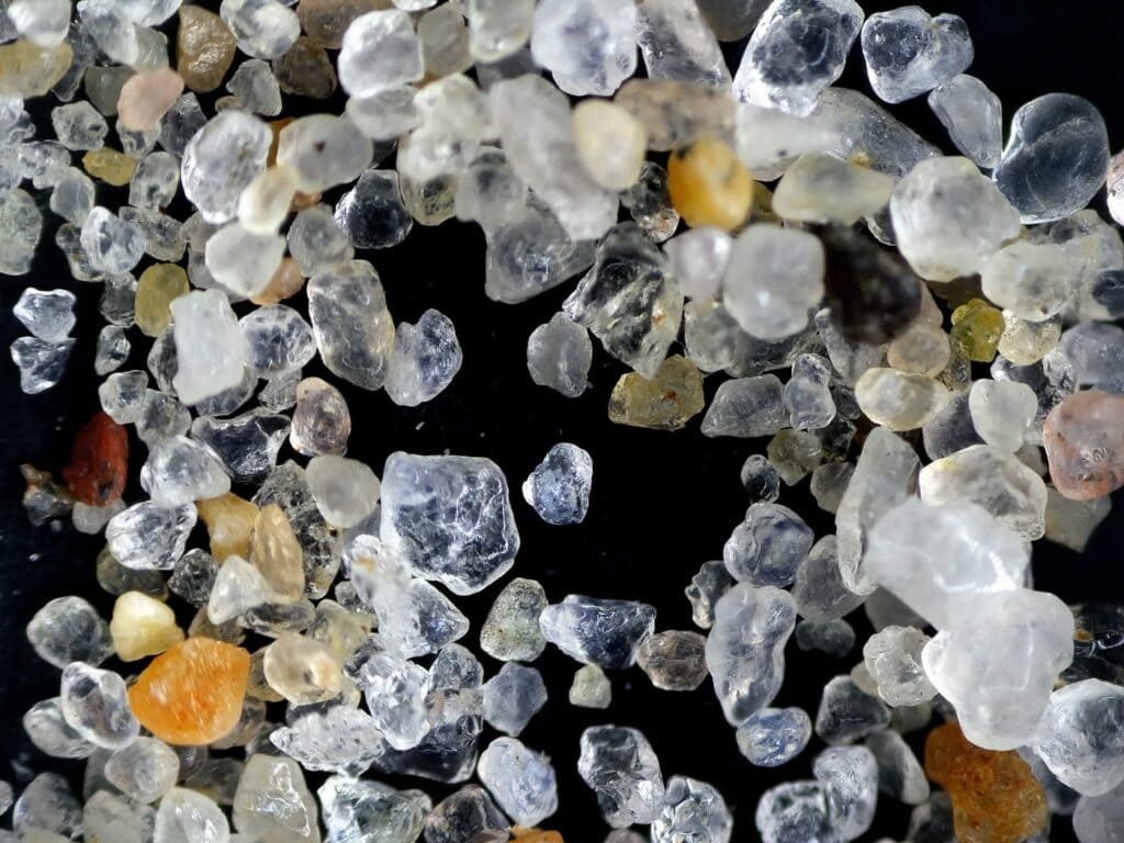 Grains of sand under a microscope